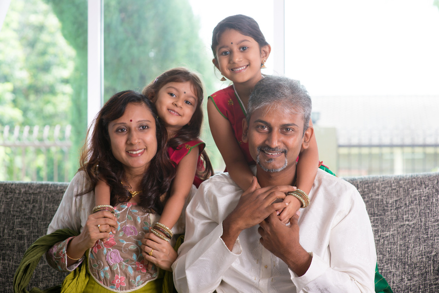 Happy Indian parents and children