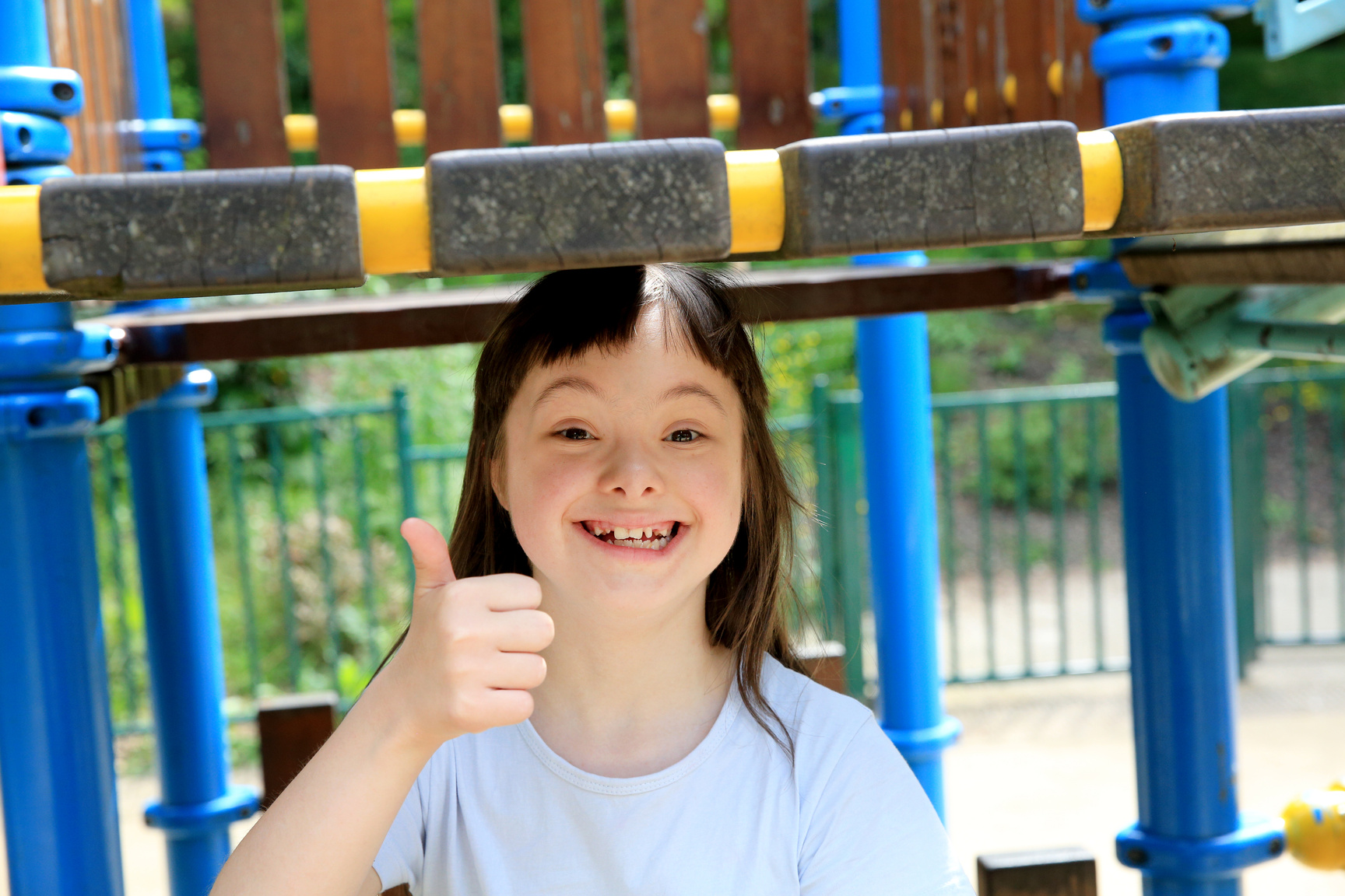 Portrait of Little Girl Smiling in the Park