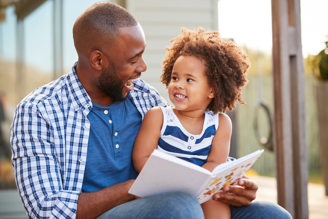 Father and Child Reading a Book