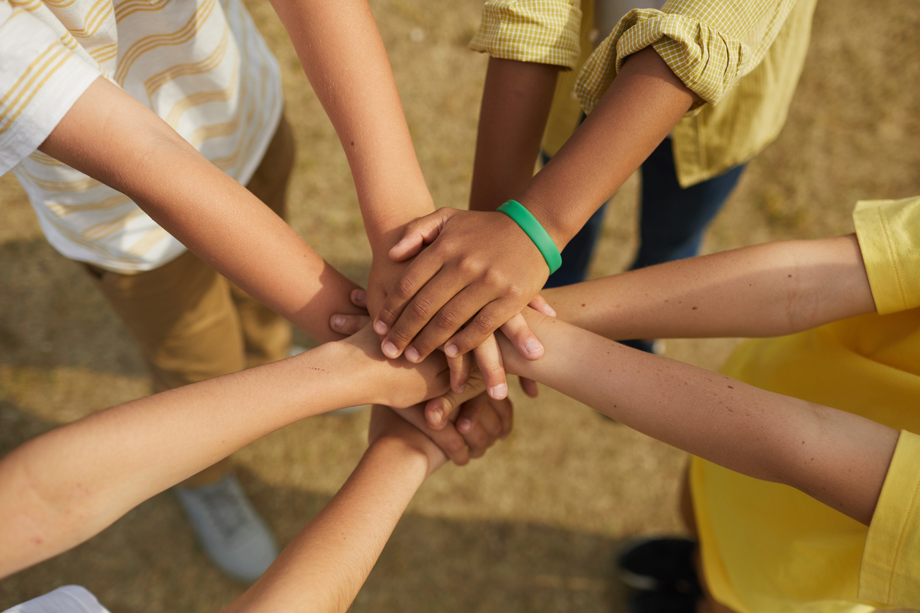 Kids Holding Hand Outdoors